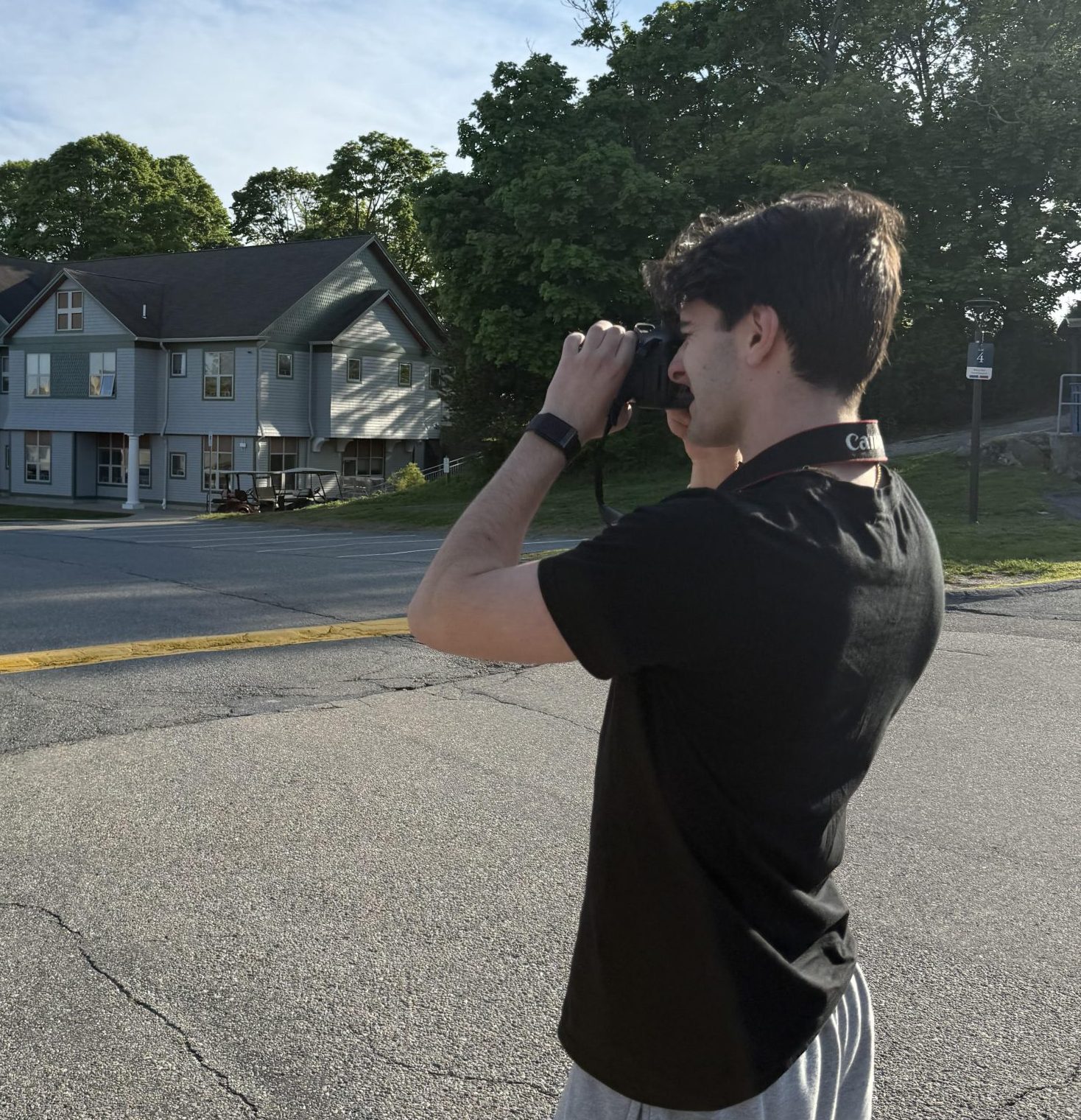 Photo of Aidan Wallad taking a photo
